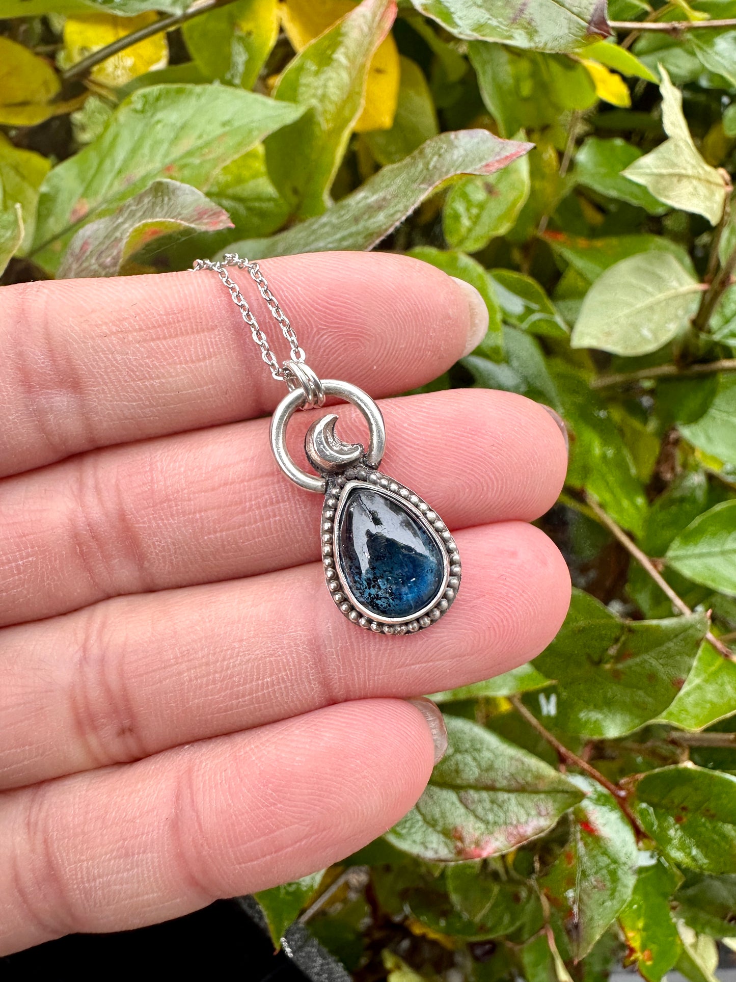 Tiny moss kyanite pendant