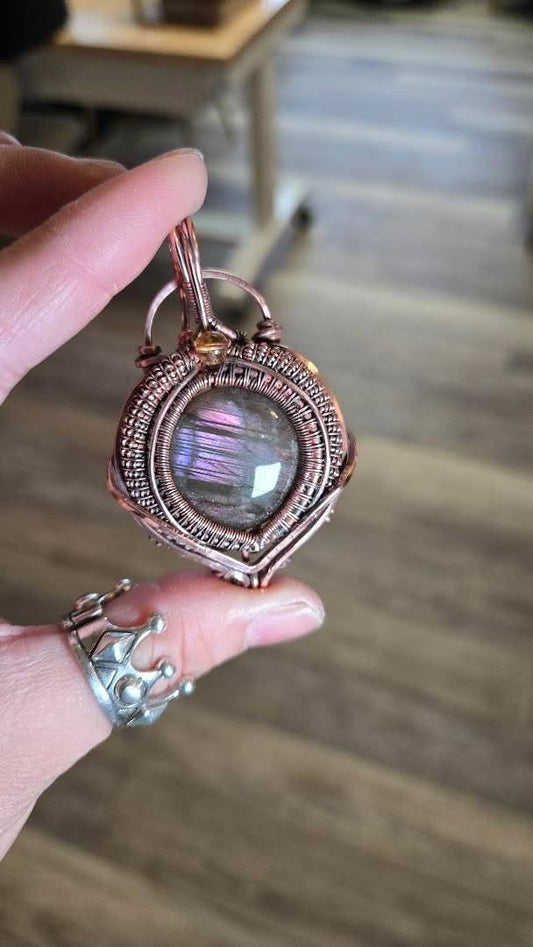Purple flash labradorite in heavy Copper wrapped pendant